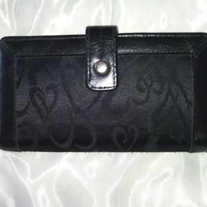 Black leather wallet with heart accents